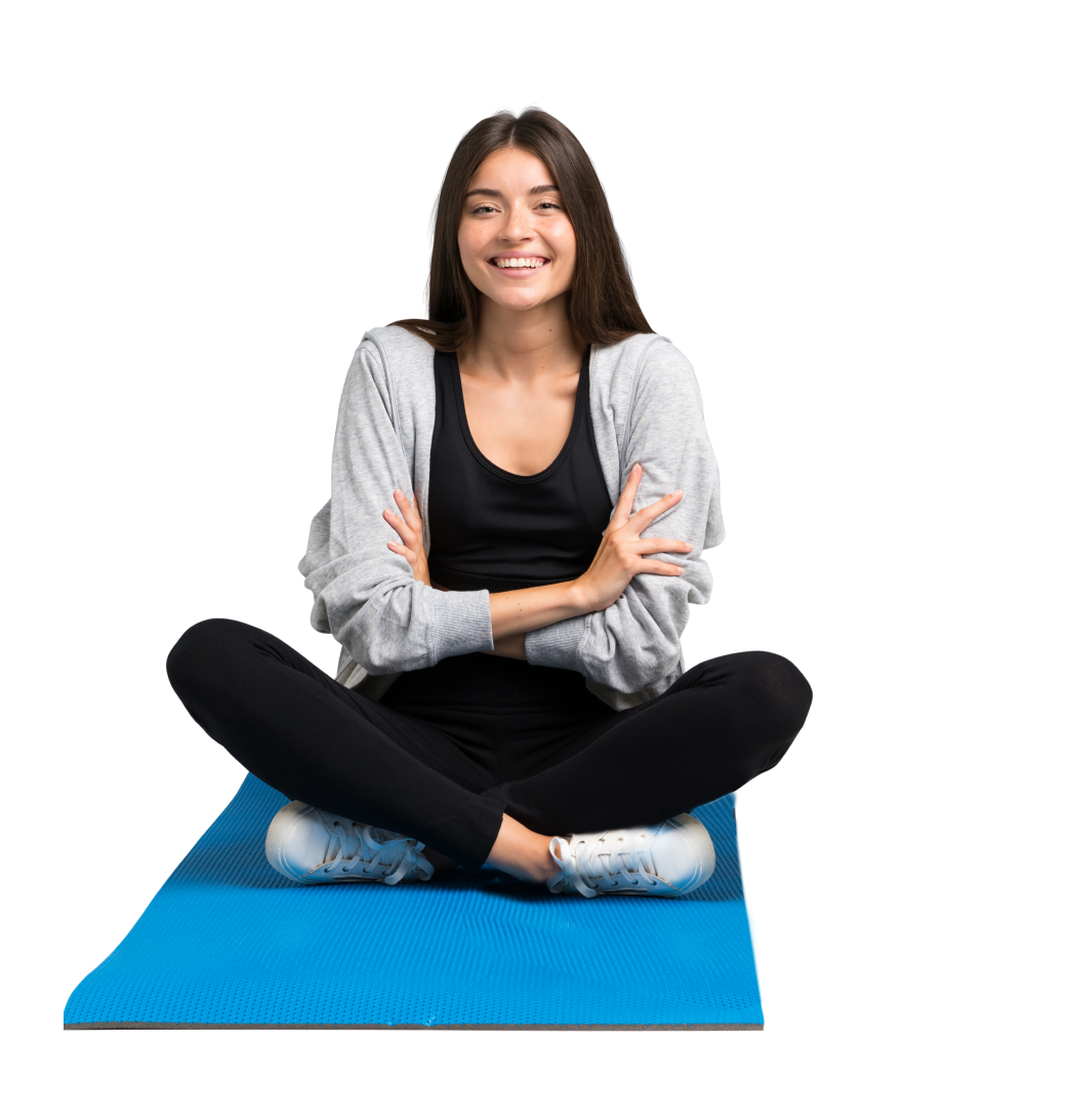 Девушка на коврике для йоги